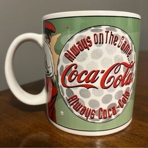 Vintage Coca Cola golf mug.